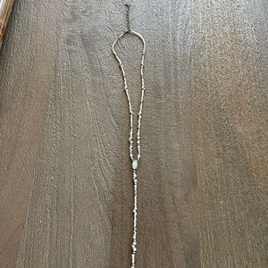 Kendra Scott Lariat necklace in white and silver.